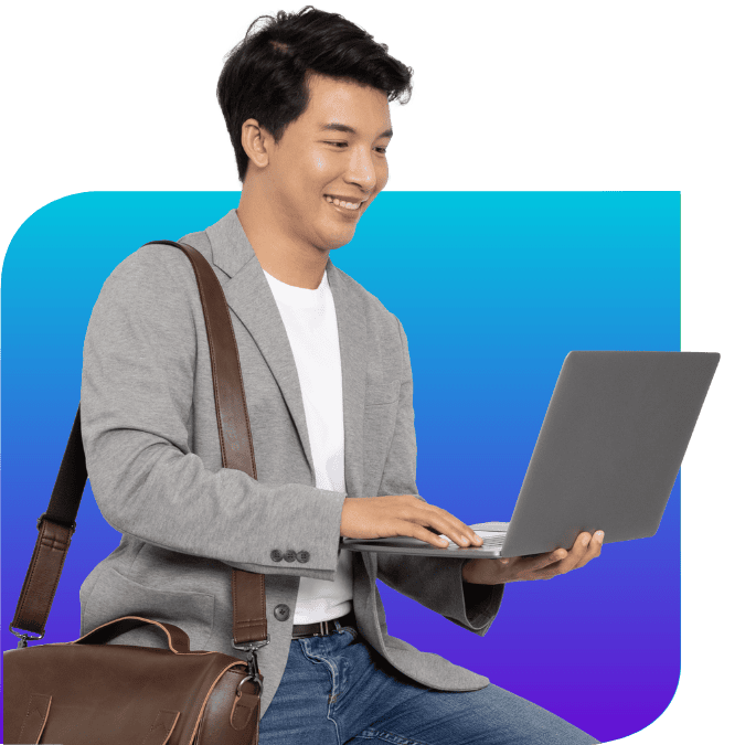 smiling man on laptop